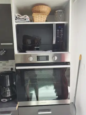 Cuisine ou kitchenette dans l'établissement PETIT COIN DE CHARME