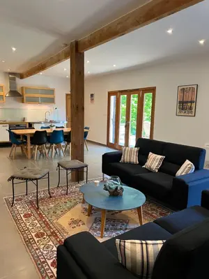 Coin salon dans l'établissement Grand gîte Gastes