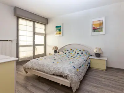 Un ou plusieurs lits dans un hébergement de l'établissement Appartement lumineux proche plage, marché et océan, Seignosse - FR-1-239-448