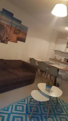 Coin salon dans l'établissement Appartement à deux pas de l ocean