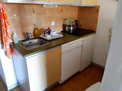 Cuisine ou kitchenette dans l'établissement Séjour zen entre océan et forêt