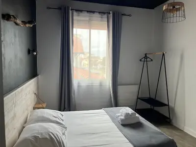 Un ou plusieurs lits dans un hébergement de l'établissement Hôtel Bellevue