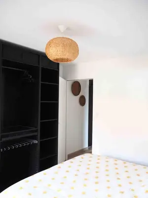 Un ou plusieurs lits dans un hébergement de l'établissement Maison à deux pas de l'océan