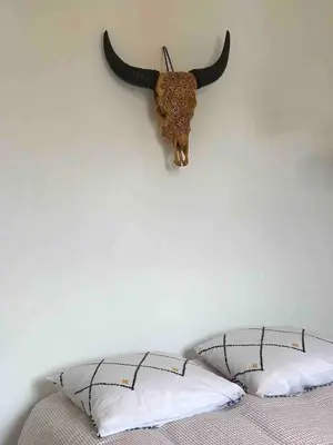 Un ou plusieurs lits dans un hébergement de l'établissement Maison à deux pas de l'océan