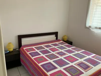 Un ou plusieurs lits dans un hébergement de l'établissement Terraced holiday home in Moliets