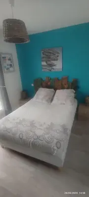Un ou plusieurs lits dans un hébergement de l'établissement EntreLac&Océan2 - Chambre d'hôtes-Entrée et Terrasse privée - cyclotouristes et motards bienvenus