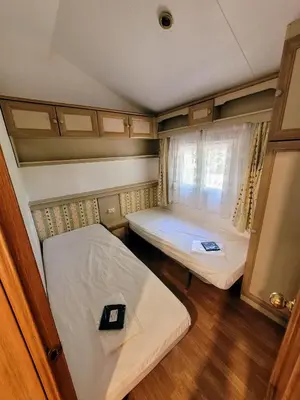 Un ou plusieurs lits dans un hébergement de l'établissement Camping baradis