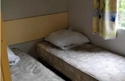 Un ou plusieurs lits dans un hébergement de l'établissement Camping baradis