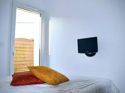 Un ou plusieurs lits dans un hébergement de l'établissement La Hume Vacances