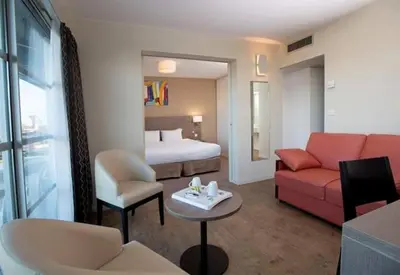 Coin salon dans l'établissement Best Western Hotel Sourcéo