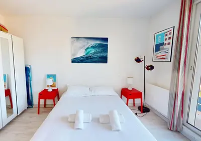 Un ou plusieurs lits dans un hébergement de l'établissement AIRIAL - Grand Appartement de standing en centre-ville