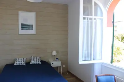 Un ou plusieurs lits dans un hébergement de l'établissement Maison Sanouva