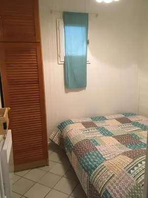Un ou plusieurs lits dans un hébergement de l'établissement Appartement vue ocean