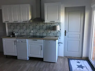 Cuisine ou kitchenette dans l'établissement agréableT2