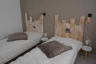 Un ou plusieurs lits dans un hébergement de l'établissement VILLA FLEUR DES PINS - 2 CHAMBRES - 3 étoiles BANC D ARGUIN