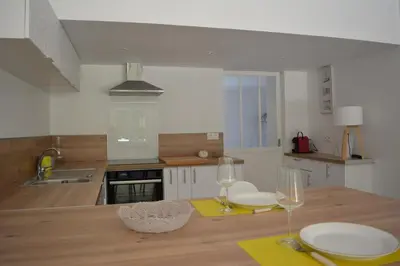Cuisine ou kitchenette dans l'établissement Villa Fleur des Pins 2 personnes Dune du Pyla