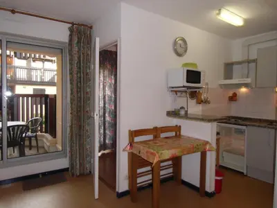 Cuisine ou kitchenette dans l'établissement Appartement vue lateral du lac