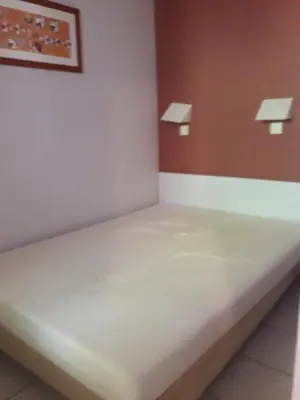 Un ou plusieurs lits dans un hébergement de l'établissement Moliets Plage Appartement pour 4 Piscine proche Plage et Commerces