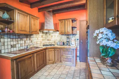 Cuisine ou kitchenette dans l'établissement Gîte chez PAT