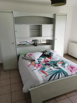 Un ou plusieurs lits dans un hébergement de l'établissement CHEZ MARTINE Appt climatisé 2 Chambres