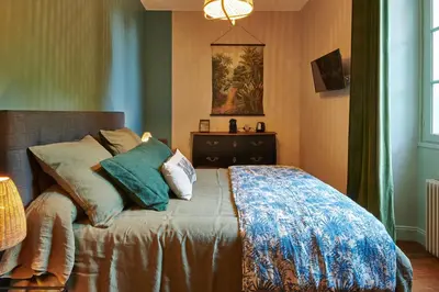 Un ou plusieurs lits dans un hébergement de l'établissement BEL AIR MAISON D'HOTES DES LANDES