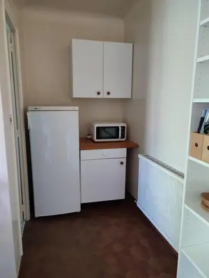Cuisine ou kitchenette dans l'établissement appartement à Capbreton en lisière de la forêt
