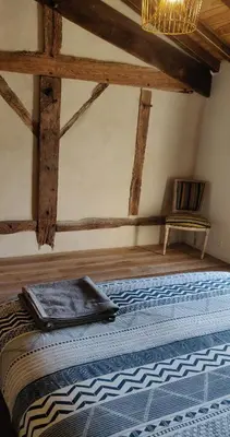 Un ou plusieurs lits dans un hébergement de l'établissement La Grange d'Hardy