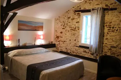 Un ou plusieurs lits dans un hébergement de l'établissement Chambre d'Hôtes au Sargaillon
