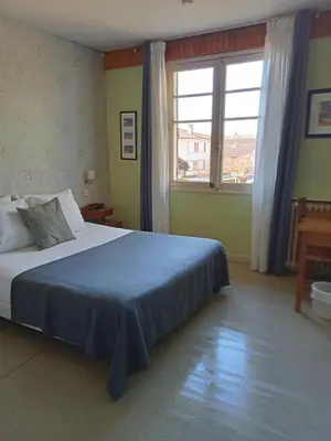 Un ou plusieurs lits dans un hébergement de l'établissement L'Auberge de Lugos