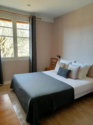 Un ou plusieurs lits dans un hébergement de l'établissement L'Auberge de Lugos