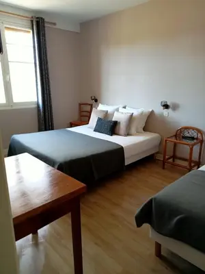 Un ou plusieurs lits dans un hébergement de l'établissement L'Auberge de Lugos