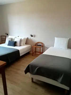 Un ou plusieurs lits dans un hébergement de l'établissement L'Auberge de Lugos