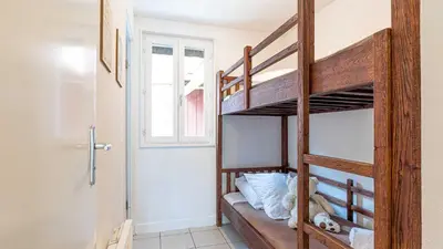 Un ou plusieurs lits dans un hébergement de l'établissement Madame Vacances Les Rives Marines