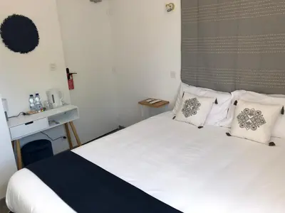 Un ou plusieurs lits dans un hébergement de l'établissement Hôtel du Lac d'Arjuzanx