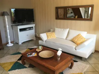 Télévision ou salle de divertissement dans l'établissement La Casa Cantarana