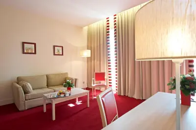Coin salon dans l'établissement Hôtel du Parc