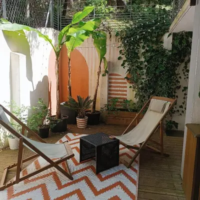 Coin salon dans l'établissement HOSSEGOR LE GARDEN lac et océan à pieds