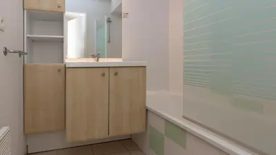 Salle de bains dans l'établissement Vacancéole - L'Allée des Dunes - Ondres Plage