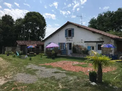 Jardin de l'établissement Chambres chez l'habitant Bambou et Musique cuisine et sdb partagées