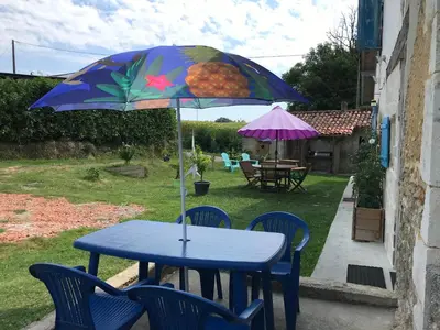 Jardin de l'établissement Chambres chez l'habitant Bambou et Musique cuisine et sdb partagées