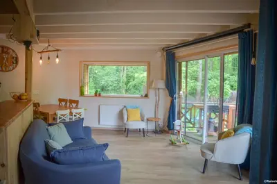 Coin salon dans l'établissement Eco logis le colibri