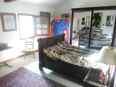 Un ou plusieurs lits dans un hébergement de l'établissement Maison rustique près de Callen avec piscine