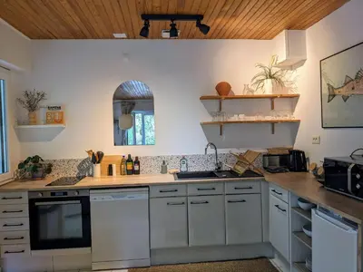 Cuisine ou kitchenette dans l'établissement HOSSEGOR LA VIGIE entre lac et océan