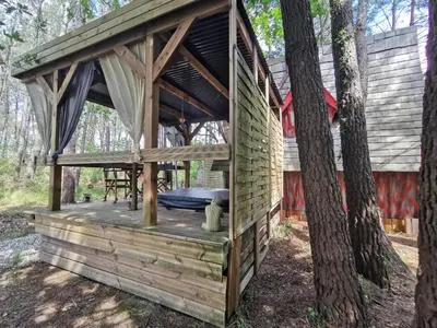 Jardin de l'établissement Cabane Spa 40