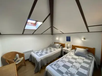 Un ou plusieurs lits dans un hébergement de l'établissement Villa 3 chambres avec parking et accès piscine - FR-1-413-106