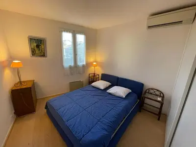 Un ou plusieurs lits dans un hébergement de l'établissement Appartement climatisé pour 4 avec balcon et parking à Capbreton - FR-1-413-101