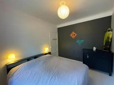 Un ou plusieurs lits dans un hébergement de l'établissement Villa Landaise Rénovée Proche Plages - Jardin et Terrasse Privatifs - FR-1-413-80