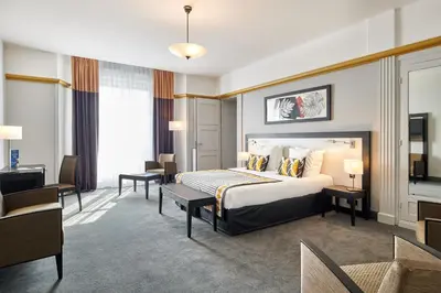 Un ou plusieurs lits dans un hébergement de l'établissement Hotel & Spa Vacances Bleues Le Splendid