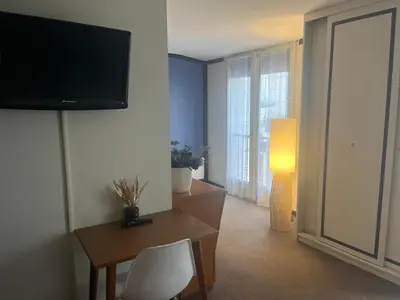 Télévision ou salle de divertissement dans l'établissement Hotel de Jouvence