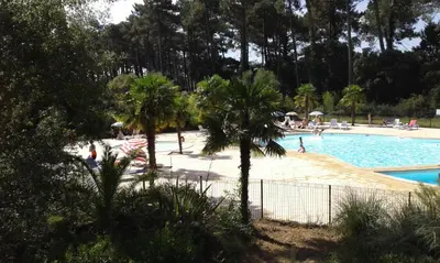 Piscine de l'établissement T2 Turquoise Ondres plage avec piscine et tennis ou située à proximité